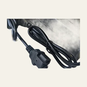 Close view of charger cable and IEC C13-style connector