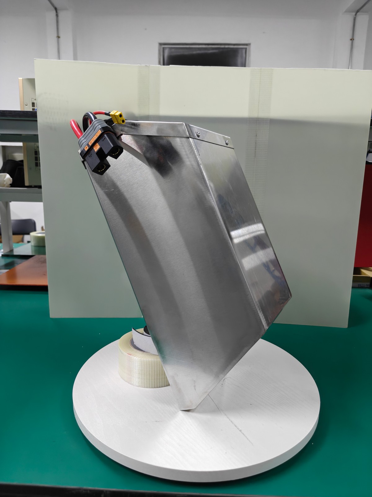 Opposite angle of the same silver shortened CRF250 case showing its depth and sloped outline