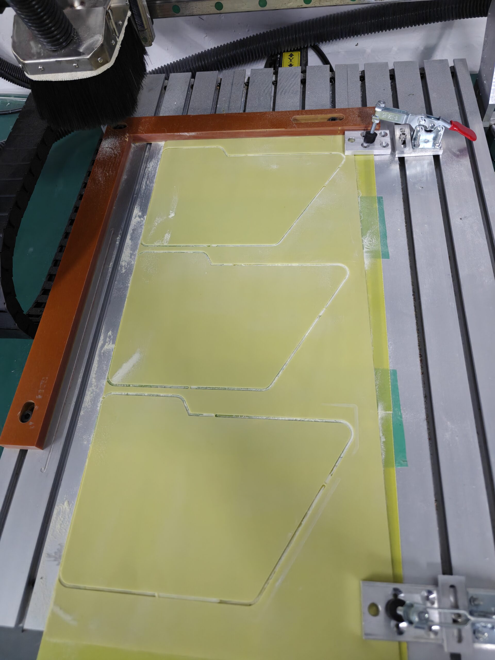 CNC machine cutting custom insulation components for lithium battery packs