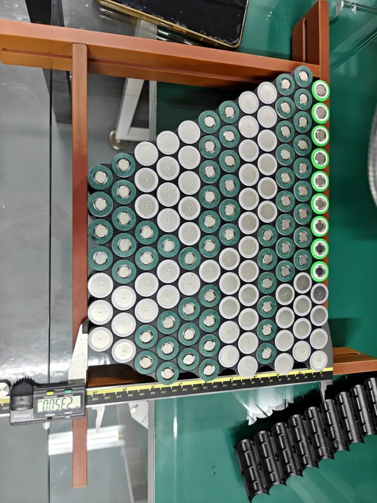 Cells going into the V-shaped holder, an earlier batch.