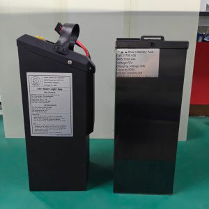DogeTune angled Light Bee battery beside a rectangular competitor pack; both labels read72V50Ah