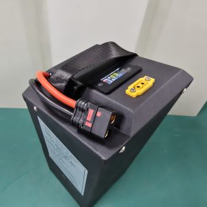 Top view of the DogeTune Light Bee battery showing its display and ports