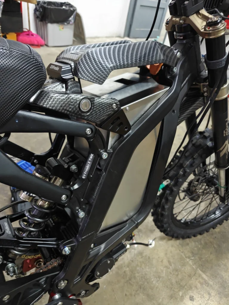 The Light Bee battery installed in the bike frame, carbon cover on top