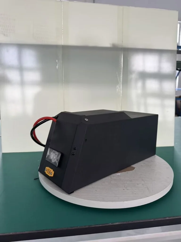 Finished Light Bee battery in its black case, side view