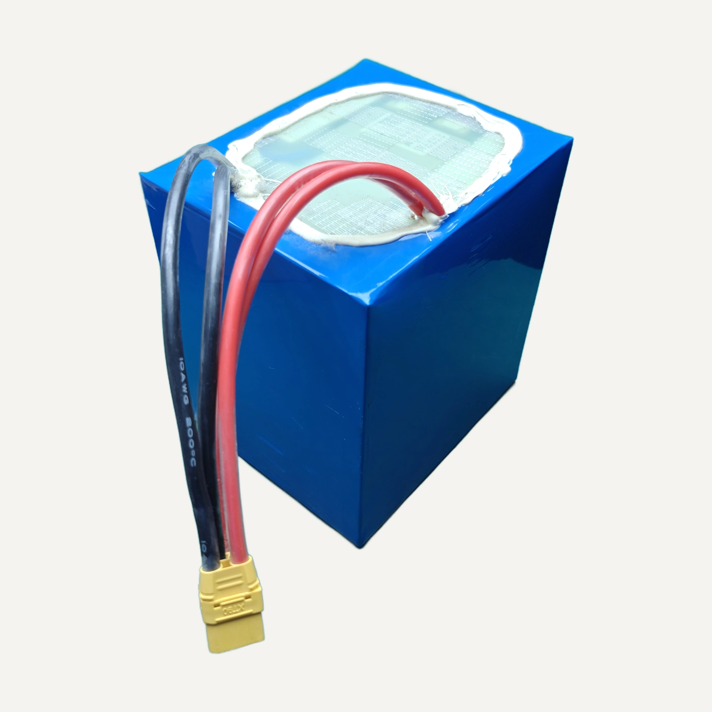 Blue wrapped battery pack with red and black leads and a yellow connector