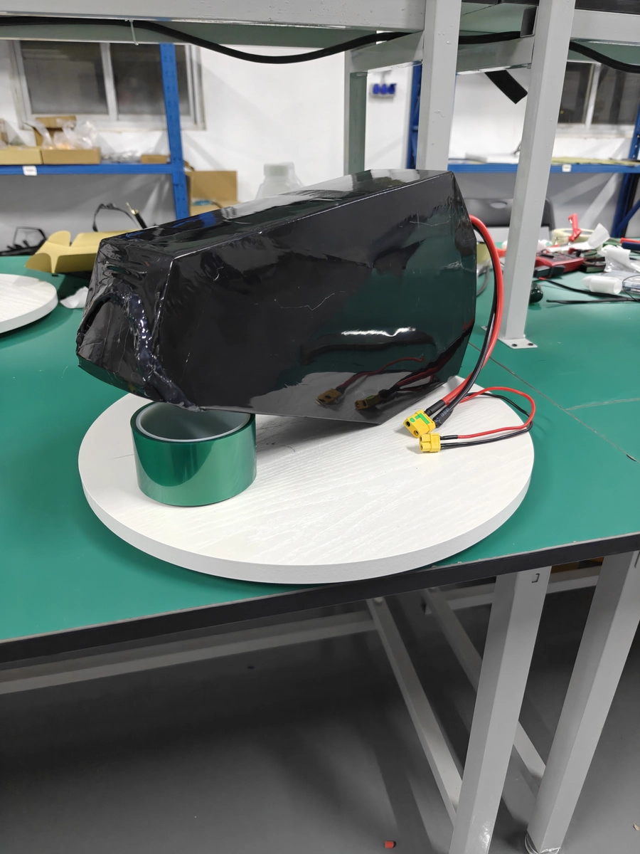 TriHepta finished battery from an alternate angle showing its side and thickness